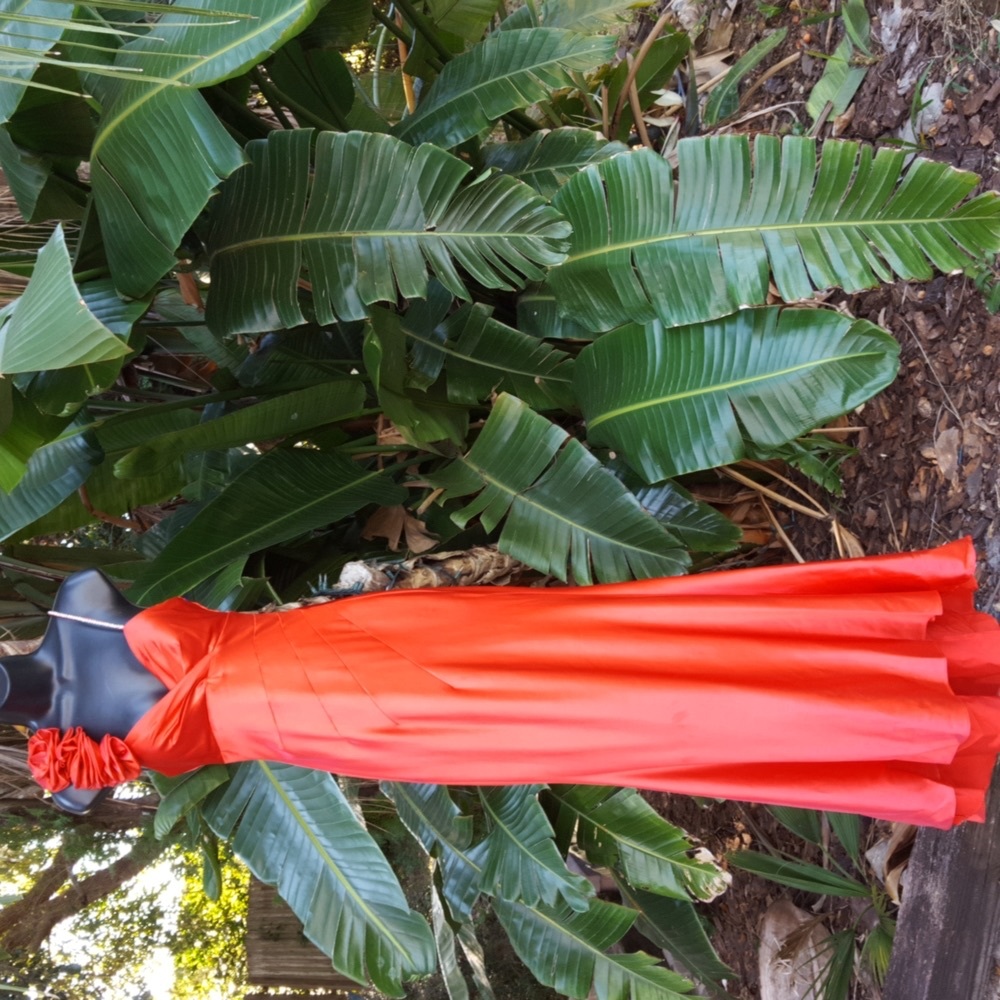 Morgan & Company red satin assymetric gown with rosettes